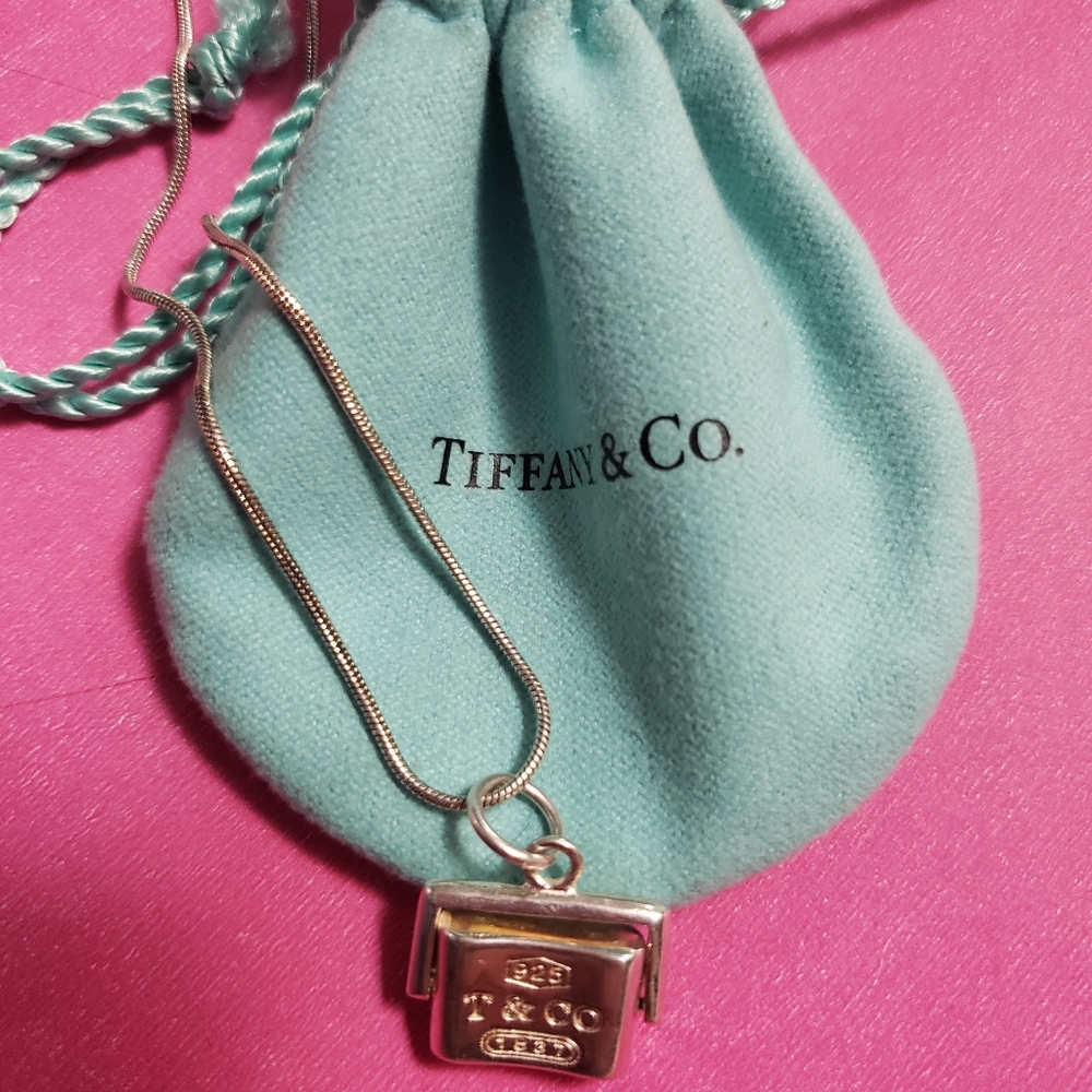 Tiffany and co. Sterling silver spinner square pendant and necklace